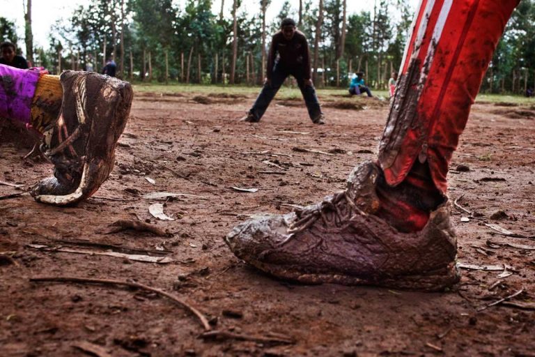 Bekoji, Ethiopia. August 2013. Runners don't stop training even during the rainy season, from June to September. This should be the resting season for the athletes but actually their training is even heavier because of the mud.