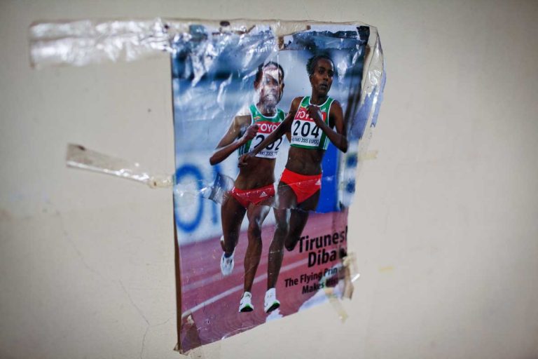 Bekoji, Ethiopia. August 2013. A poster on the wall of the female dormitory in the live-in Athletic Centre in Bekoji. Tirunesh Dibaba is the 5000m world record holder and she won eight gold medals in the Olympics and the Athletic World Championship. She is from Bekoji.